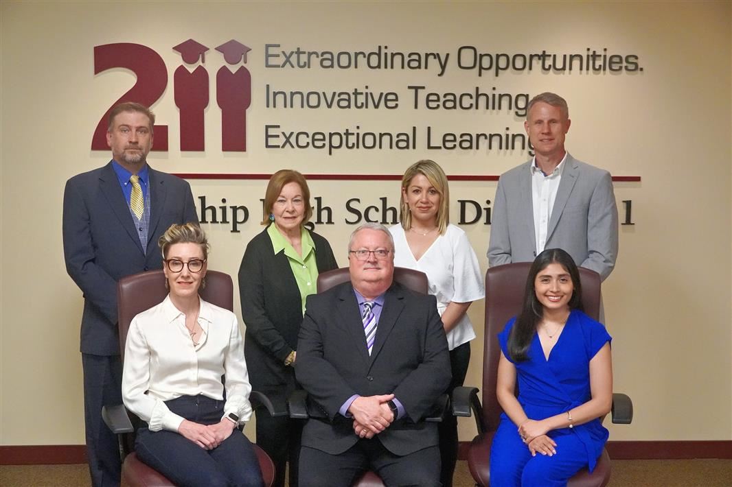The District 211 Board of Education members. The District 211 Board of Education members.